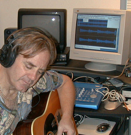 Another shot of John recording his music.
